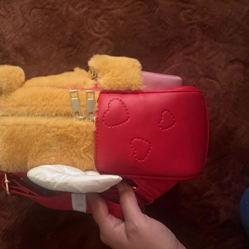 Her Universe Pooh Bear Plush Backpack with Red and Pink Accents - Picture 4 of 8